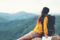 Woman travelÃÂ hiker adventure on mountain nature landscape. Asia lifestyle tourist girl backpack sitting with map to find directio Royalty Free Stock Photo